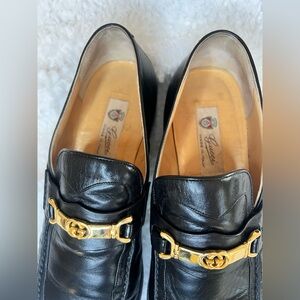 Gucci Black Leather Slip-Ons with Gold Detail